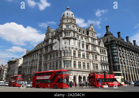 LONDON, UK - JULY 7, 2016: New Routemaster buses in Westminster, London. The hybrid diesel-electric bus is a new, modern version of iconic double deck Stock Photo