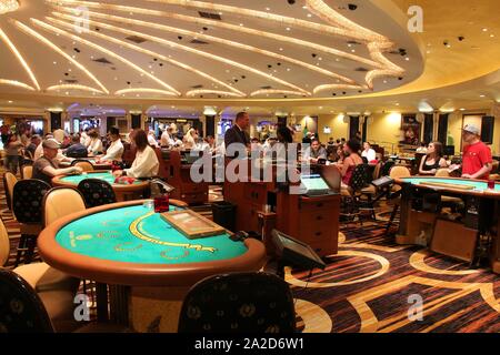 LAS VEGAS, USA - APRIL 14, 2014: People visit Bellagio resort in Las Vegas.  The famous casino resort has almost 4,000 rooms Stock Photo - Alamy