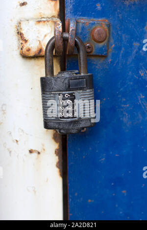 Old rusty padlock conveying the concept of safety and secure Stock Photo