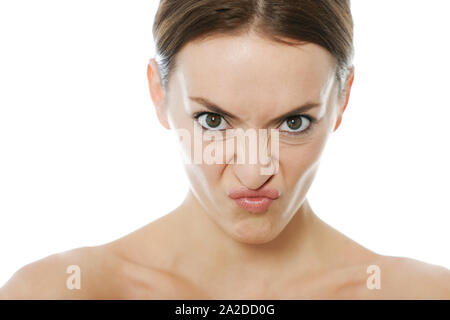Attractive young woman looking disgusted and annoyed Stock Photo