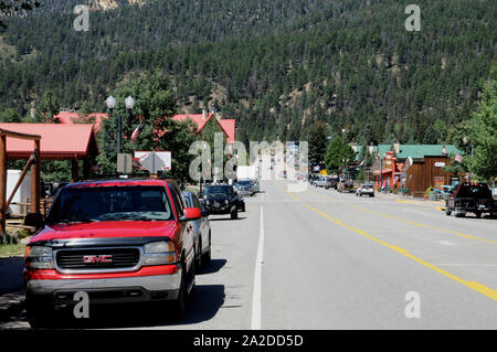 Main street in the town of Red River in northern New Mexico. Many of the wooden buildings have been given old west facades. Stock Photo