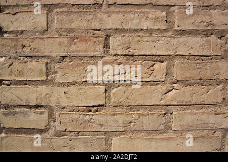 Close-up of an old light brown brick wall for abstract backgrounds Stock Photo