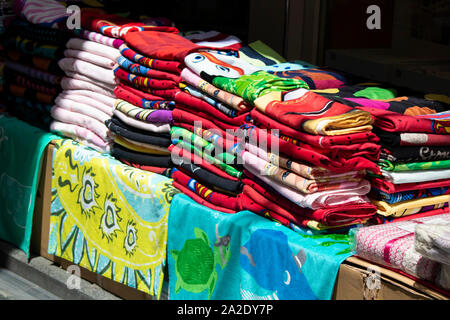 Fabrics in different patterns lined up in a row. Stock Photo