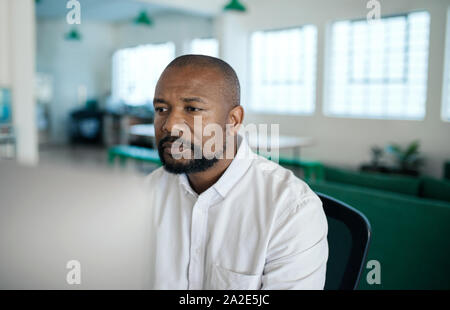 African American businessman working on a computer in an office Stock Photo
