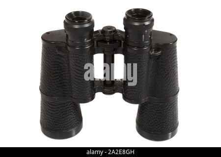 Black binoculars on white background. Stock Photo