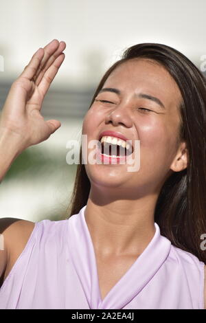 A Singing Filipina Female Stock Photo