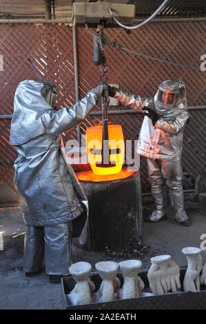 LOS ANGELES, CA. January 21, 2011: Casting of the solid bronze Actor¨ statuettes to be awarded at the 17th Annual Screen Actors Guild Awards on January 30th. The statuettes were cast at the American Fine Arts Foundry in Burbank, California. Each statuette weighs 12 pounds and stands 16 inches tall. They Actor was sculpted by Edward Saenz and designed by Jim Helmann and Jim Barrett. © 2011 Paul Smith / Featureflash Stock Photo