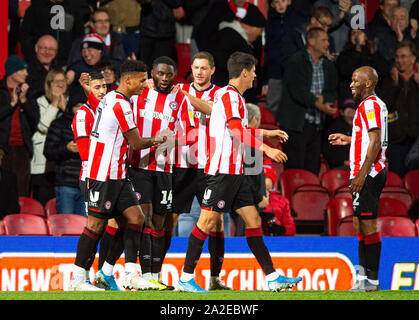 London, UK. 02nd Oct, 2019. Brentford's Josh Dasilva no 14 celebrating his goal during the Sky Bet Championship match between Brentford and Bristol City at Griffin Park, London, England on 2 October 2019. Photo by Andrew Aleksiejczuk/PRiME Media Images. Credit: PRiME Media Images/Alamy Live News Stock Photo