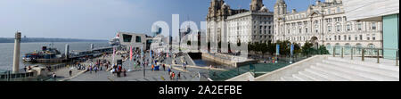 Panorama of iconic Liverpool Waterfront. Photo taken on the stairs of Museum of Liverpool. Stock Photo