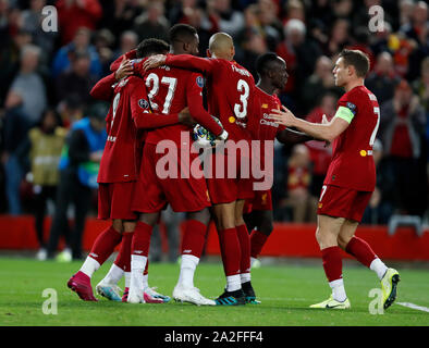 Liverpool. 2nd Oct, 2019. Liverpool's players celebrate the winning goal by Mohamed Salah during the UEFA Champions League Group E match between Liverpool and Salzburg in Liverpool, Britain on Oct. 2, 2019. Liverpool won 4-3. Credit: Han Yan/Xinhua/Alamy Live News Stock Photo