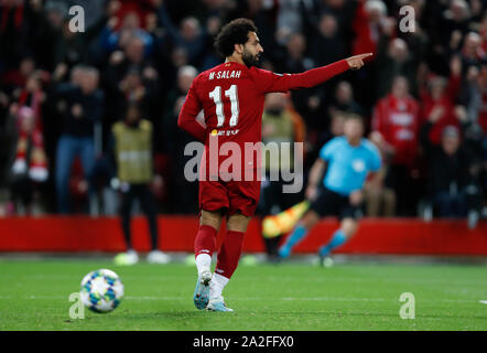 Liverpool. 2nd Oct, 2019. Liverpool's Mohamed Salah celebrates after scoring during the UEFA Champions League Group E match between Liverpool and Salzburg in Liverpool, Britain on Oct. 2, 2019. Liverpool won 4-3. Credit: Han Yan/Xinhua/Alamy Live News Stock Photo