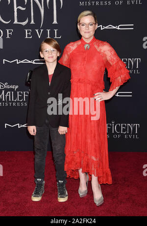 HOLLYWOOD, CA - SEPTEMBER 30: William Robert Cowles and producer Kathleen Robertson attend the World Premiere of Disney's “Maleficent: Mistress of Evil' at El Capitan Theatre on September 30, 2019 in Los Angeles, California. Stock Photo