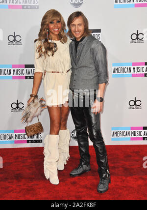 LOS ANGELES, CA. November 20, 2011: David Guetta & Cathy Guetta at the 2011 American Music Awards at the Nokia Theatre L.A. Live in downtown Los Angeles. © 2011 Paul Smith / Featureflash Stock Photo