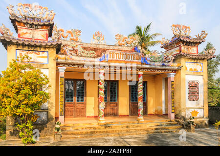 Hoi An, Vietnam - March 3rd 2010: Chinese temple. Despite being an Atheist state forms of buddhism, taoism and confucianism are pratised. Stock Photo