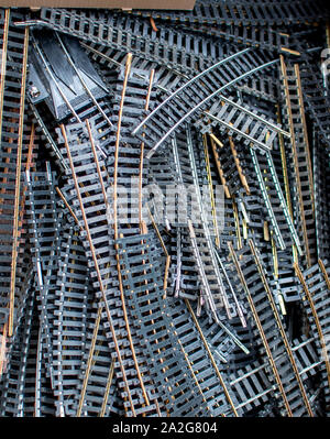 An old box of old train tracks for a model railroad is for sale at a toy swap meet in Indiana USA Stock Photo