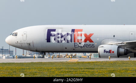 FedEx Express MD-11F (N596FE) leaving the runway after landing at Toronto Pearson Intl. Airport. Stock Photo