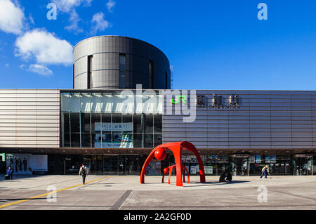 DEC 2, 2018 Hakodate, JAPAN - JR JR Hakodate Station building with tourists at front square under bright sunlight in winter Stock Photo