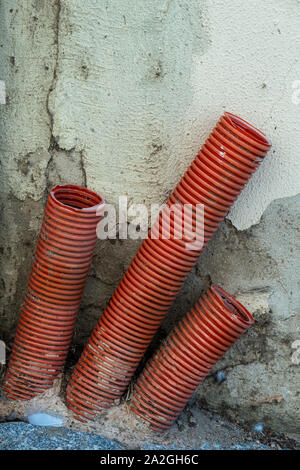 Still life. three plastic tubes for electric cables Stock Photo
