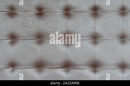 Light black luxury upholstery sofa texture background concept for clean gray vintage leather furniture pattern wallpaper, closeup interior elegant arm Stock Photo
