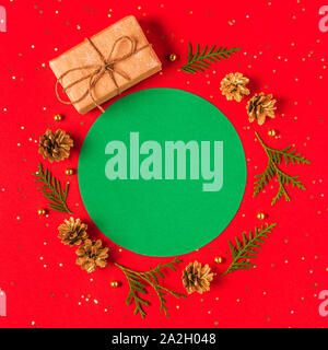 Christmas composition on a red background. Flat lay, top view, mockup. Stock Photo