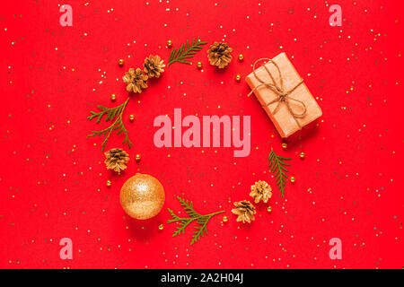 Christmas composition on a red background. Flat lay, top view, mockup. Stock Photo