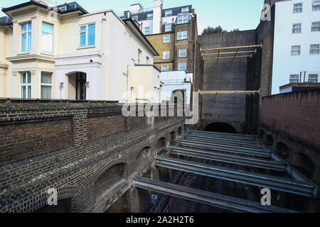 An exterior rear view of 23-24 Leinster Gardens, west London, showing a facade of two five-storey 'pretend' houses. Stock Photo