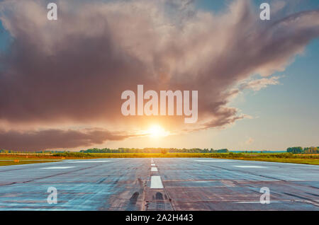 Empty lane in the morning at dawn at the airport Stock Photo