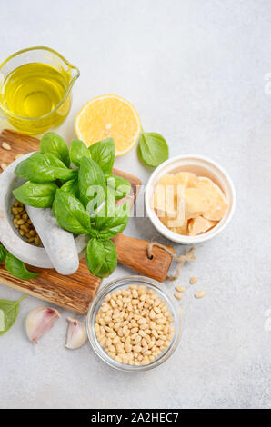 Ingredients for making green pesto sauce. Stock Photo