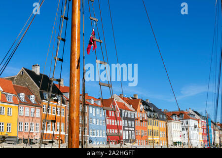 Nyhavn waterfront with colorful houses, canal and entertainment district in Copenhagen, Denmark Stock Photo