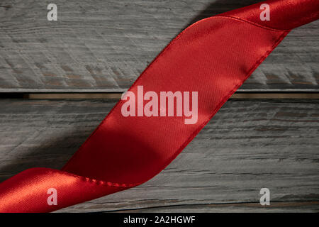 items for wrapping packages lie on a wooden table Stock Photo