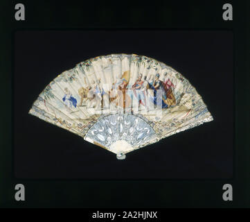 Fan, 18th century, France, Ivory guards and sticks, etched and carved, metal and mother-of-pearl insets, paper mount painted, gold leaf, metal pin with imitation gemstones, 29.5 × 50.5 cm (11 5/8 × 19 7/8 in Stock Photo