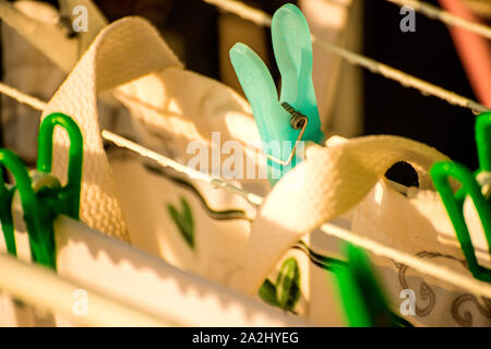 drying rack on a balcony with raindrops Stock Photo