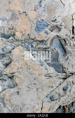 Rock texture with blue and ochre tones. Stock Photo