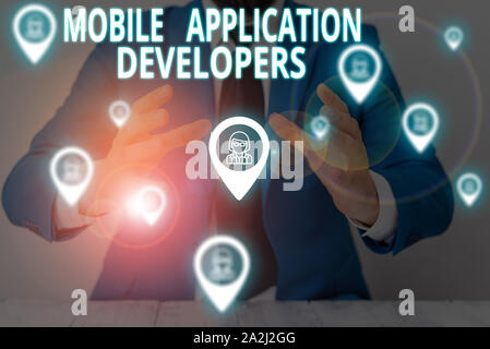 Conceptual hand writing showing Mobile Application Developers. Concept meaning create software for devices like app store Male wear formal suit presen Stock Photo