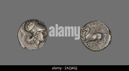 Stater (Coin) Depicting the Goddess Athena, 317/310 BC, Greek, Syracuse, Silver, Diam. 2 cm, 8.66 g Stock Photo