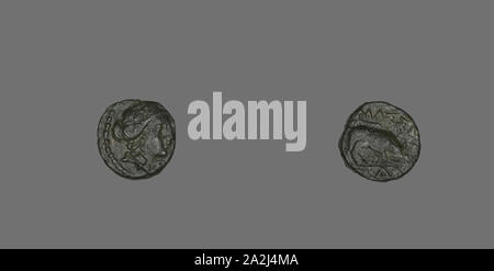 Coin Depicting the God Apollo, after 250 BC, Greek, Greece, Bronze, Diam. 1.3 cm, 1.89 g Stock Photo