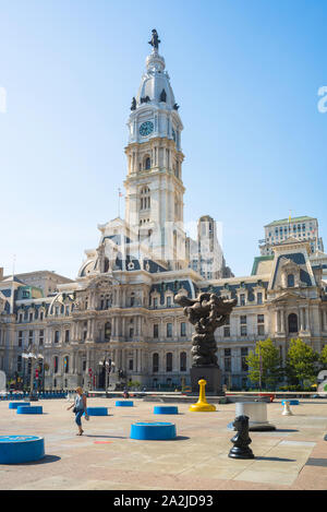 Downtown Philadelphia, view of City Hall building with the Board Game Art Park in Municipal Services Plaza in the foreground, Philadelphia, PA, USA Stock Photo