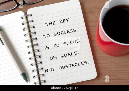 Motivational and Inspirational Quote - The key to success is to focus on goals. Not obstacles. Stock Photo