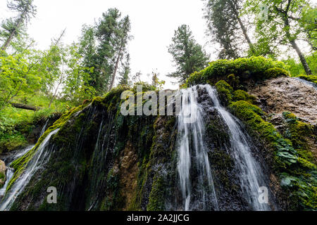 The waterfall in Altai mountains in Altai Republic. Russian summer in Siberia. Stock Photo