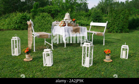 Wedding decorations for table in rustic style in nature - spring time Stock Photo