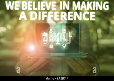 Writing note showing We Believe In Making A Difference. Business concept for selfconfidence that can be unique Stock Photo