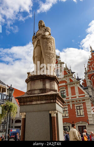Rigger Roland Statue in the Town Square with Black Heads house in the background, Riga, Latvia, Stock Photo