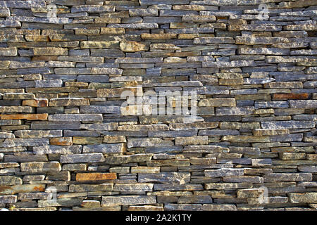 Stacked slate bricks wall texture Stock Photo