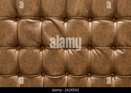 Pattern brown leather sofa texture background. Stock Photo