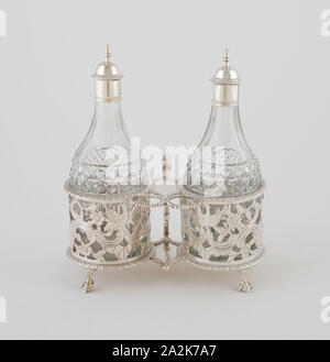 Cruet Set, c. 1760, Thomas Williamson, Irish, active 1750-70, Dublin, Ireland, Dublin, Silver and glass, Stand: 8.6 × 16.7 × 11 cm (3 3/8 × 6 9/16 × 4 5/8 in.), Bottles (with caps): 17.5 × 6 cm (6 7/8 × 2 3/8 in Stock Photo