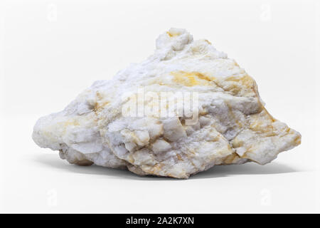 White Rock Marble isolated on white background. Piece of natural mineral close up Stock Photo