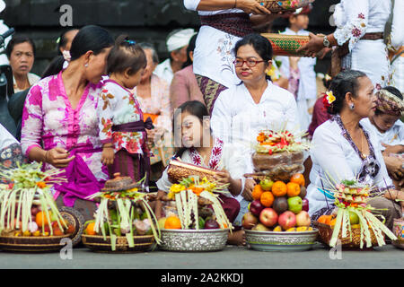 Bali, Indonesia - Feb 2, 2012 - Hari Raya Galungan and Umanis Galungan holiday fesival parade - the days to celebrate the victory of Goodness over Stock Photo