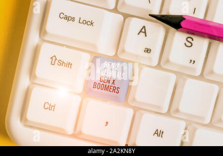 Conceptual hand writing showing Gen Z Millennials Gen X Boomers. Concept meaning Generational differences Old Young showing White pc keyboard with not Stock Photo