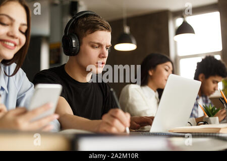 Group of students studying in university library Stock Photo