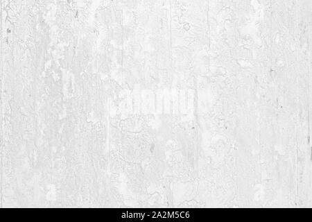 White grunge rusty painted urban texture on wood background Stock Photo